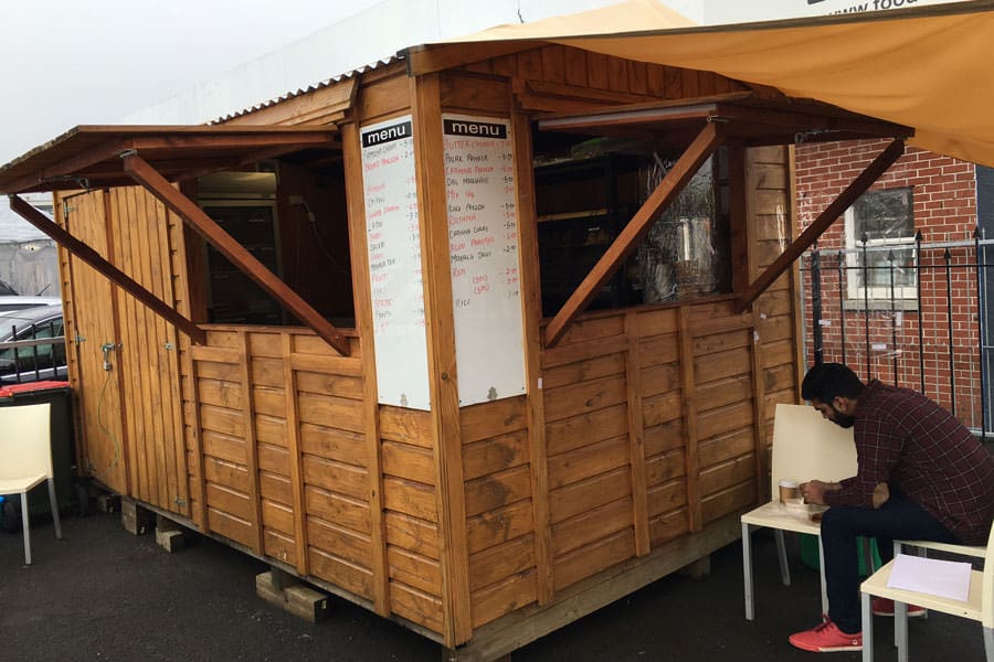 A beautiful, rustic timber shed utilised as a food truck or food shop